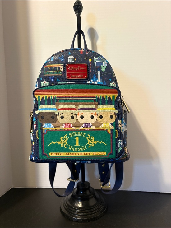 Loungefly Handbags - Loungefly Never Used Navy Main Street Railway Mini Backpack